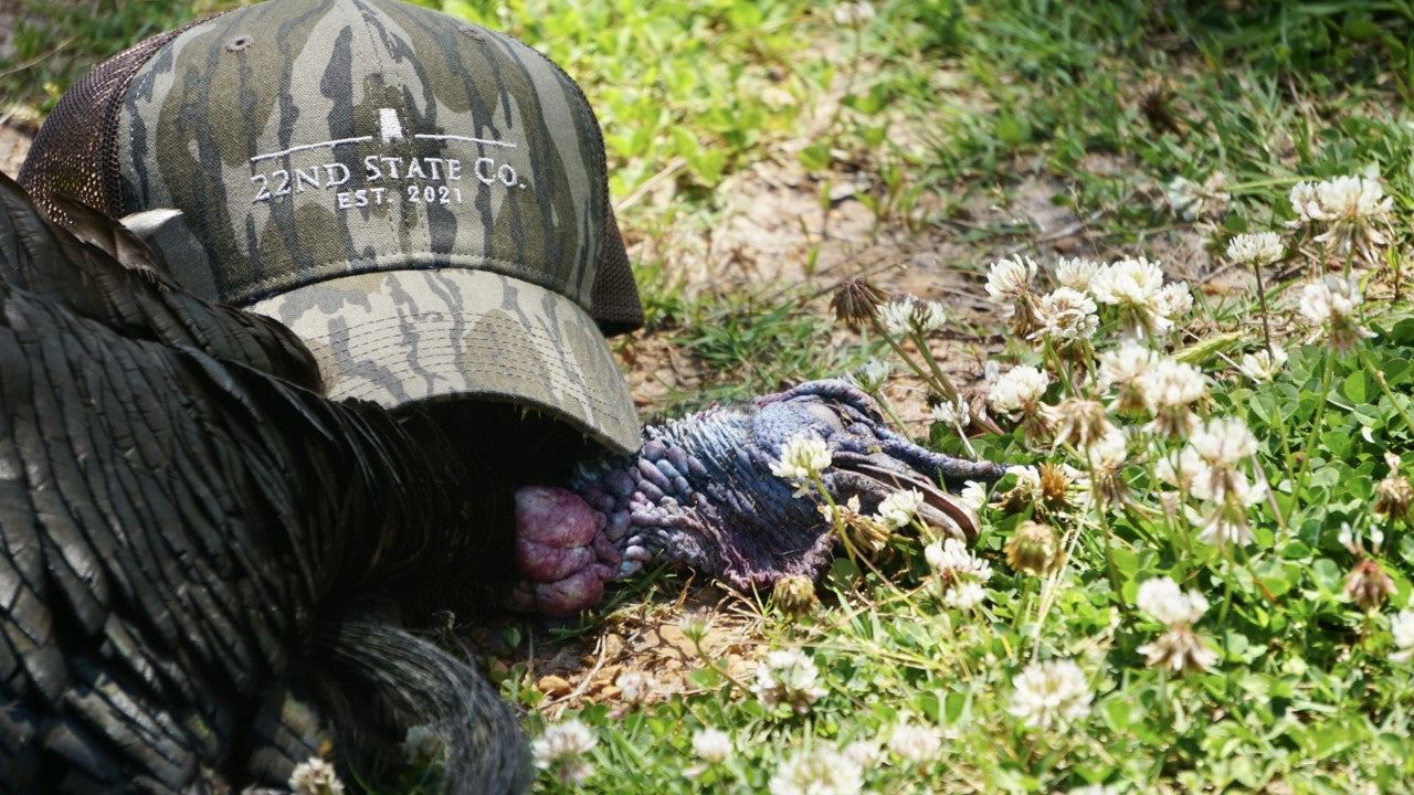 "22nd State Logo Hat" -Low Profile Trucker Cap (Mossy Oak Bottomland)